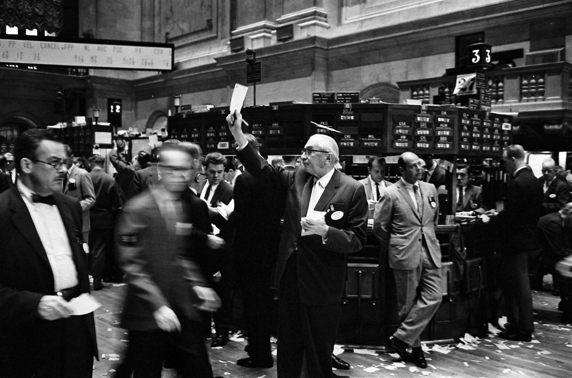 Brokers and specialists at work on the trading floor of the New York Stock Exchange